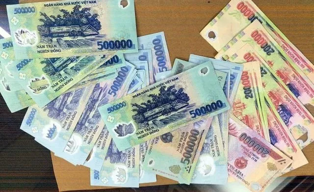Cảnh giác với tiền giả trong dịp Tết