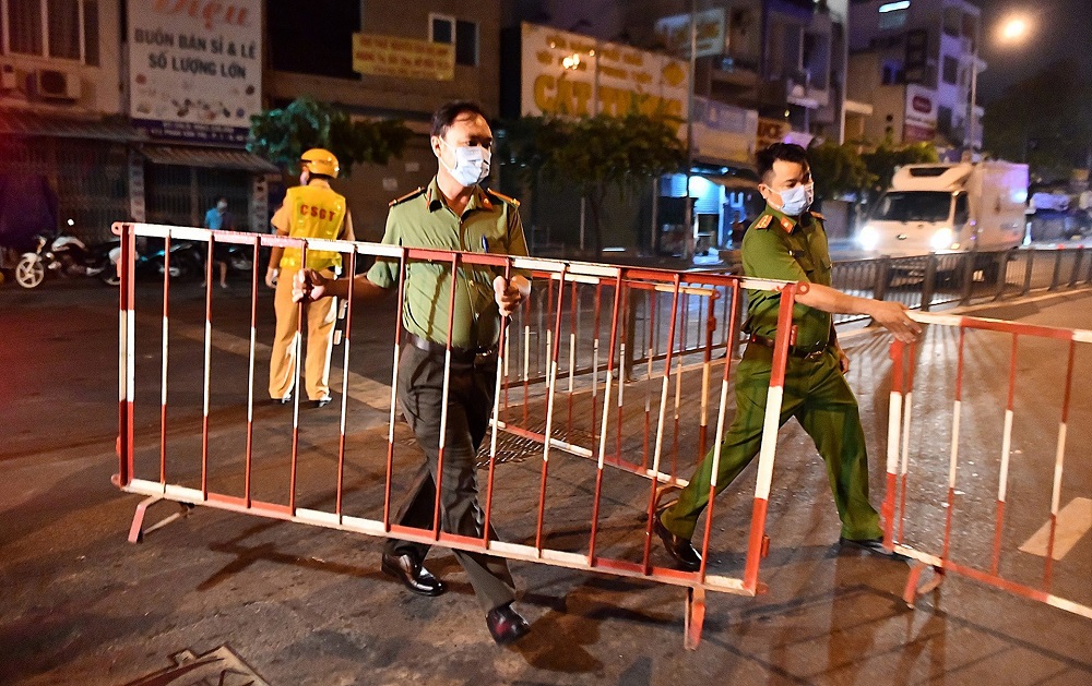 What should Ho Chi Minh City do in 15-day partial lockdown?