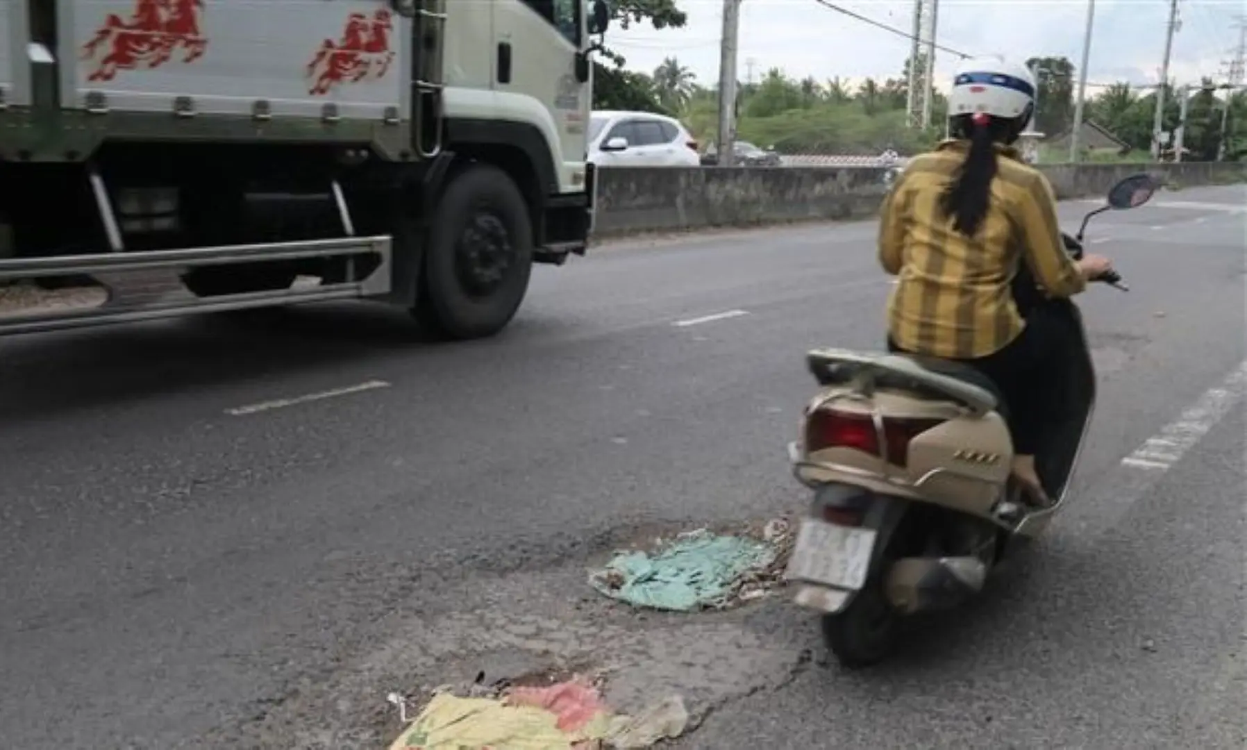 Vì sao Quốc lộ 1A qua Tiền Giang bị hư hỏng?