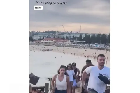 Đêm kinh hoàng ở Australia: cha con xả súng, 16 người thiệt mạng