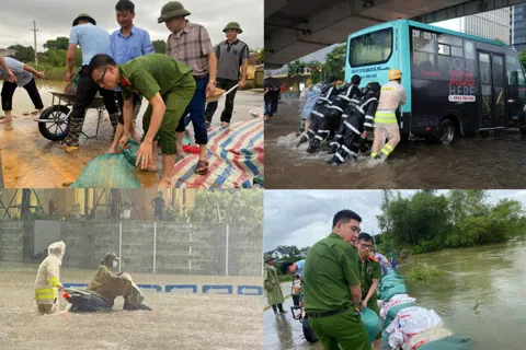 Lực lượng Công an Hà Nội dầm mưa cùng Nhân dân phòng chống bão lũ