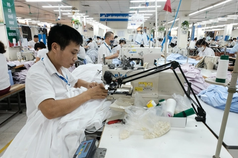 Xuất khẩu dệt may tăng trưởng trong khó khăn